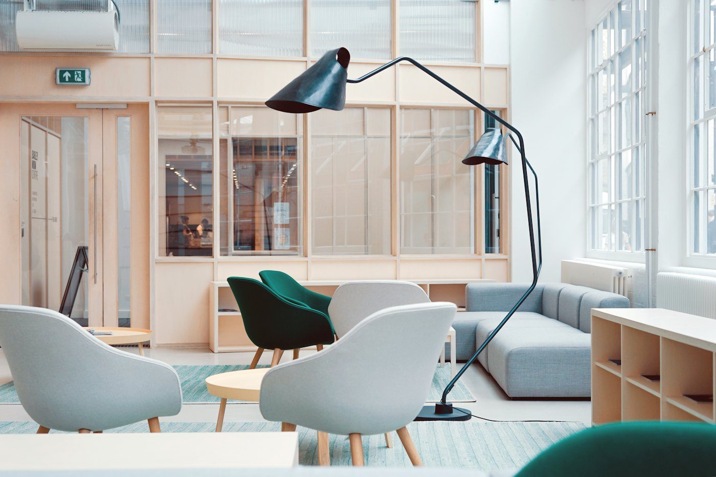 A bright meeting room with a long wooden table